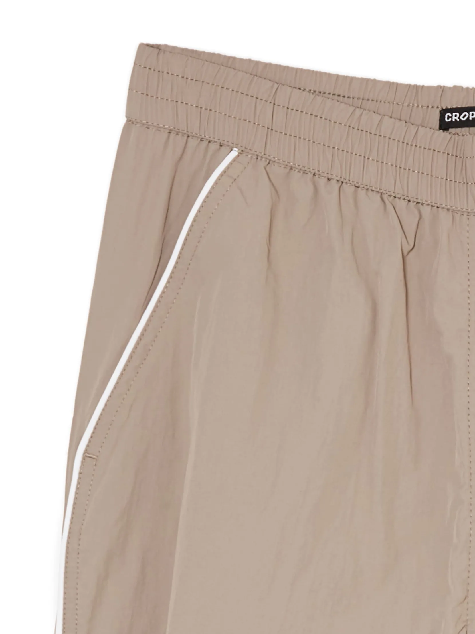 Sale Beżowe spodnie jogger Spodnie