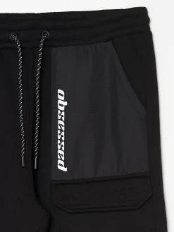 Sale Czarne dresowe joggery z efektem reflective Spodnie