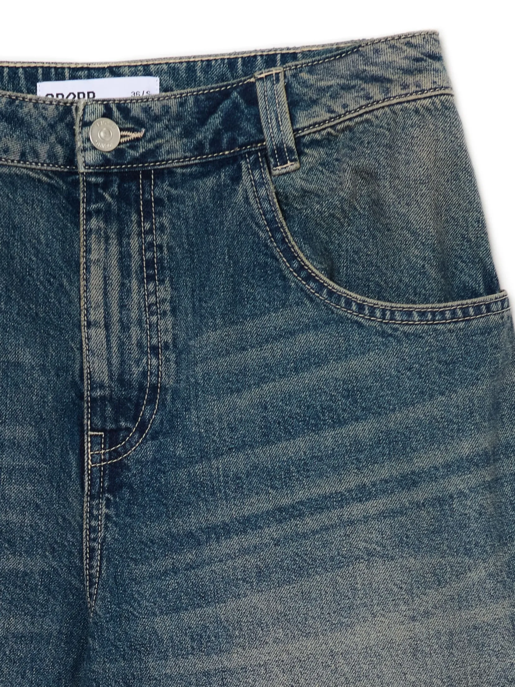Outlet Granatowe jeansy skater z efektem sprania Jeansy