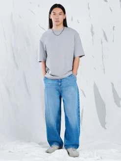 Sale e jeansy skater z efektem sprania Jeansy